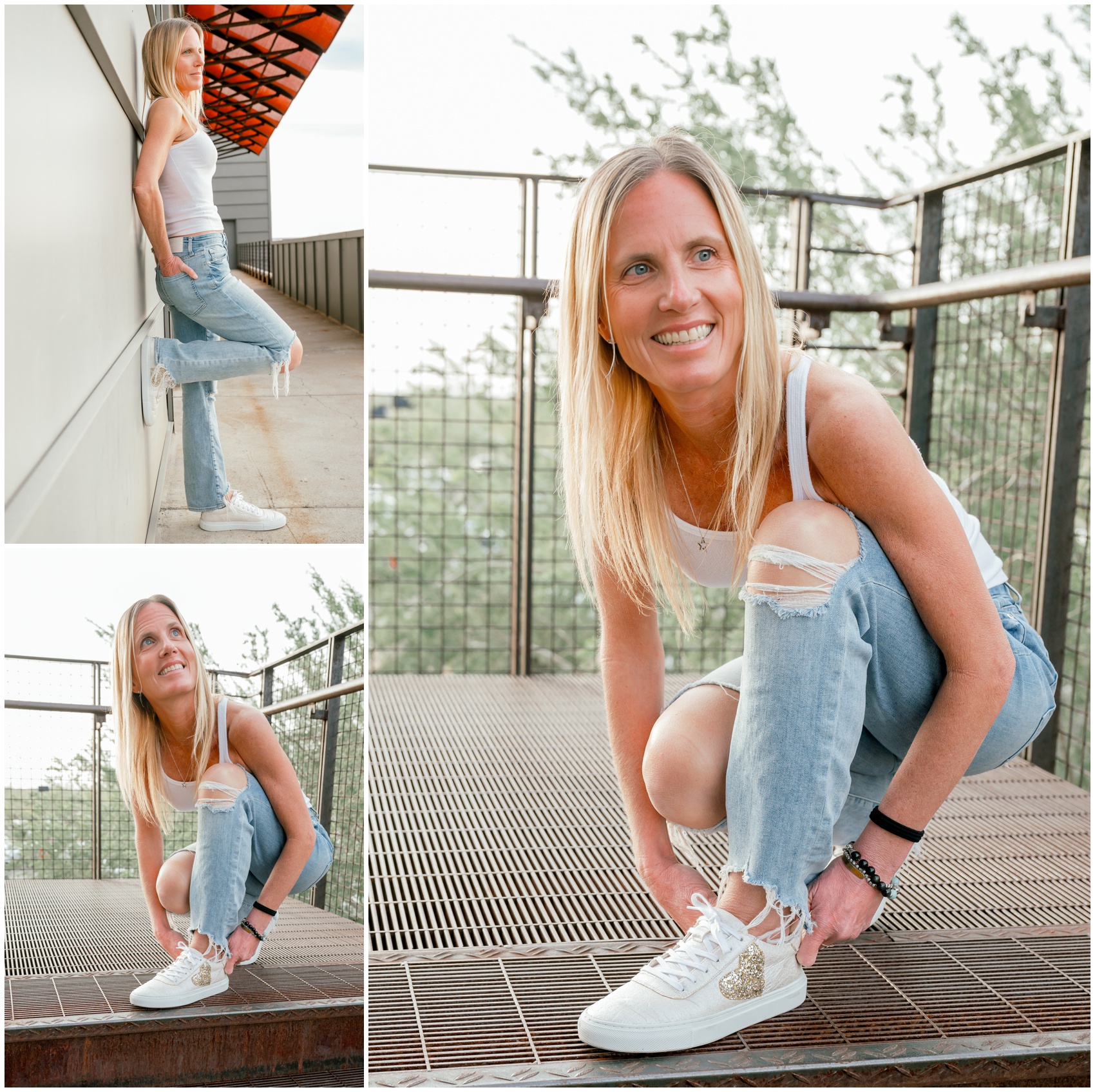 A woman on a balcony in jeans and white top